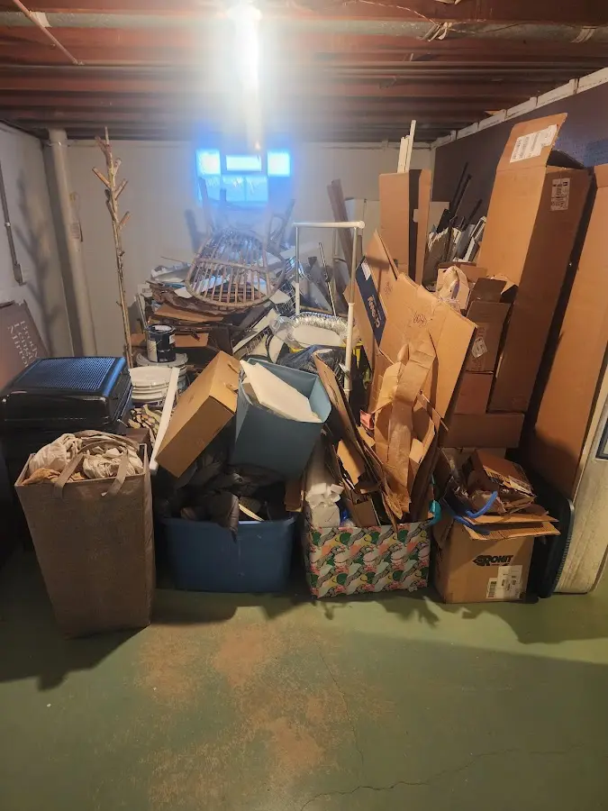 Roll-off dumpster container at job site for 8 Yard Dumpster Rental in Summerfield